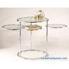 Flat-tube glass swivel table with a big and three small tabletops