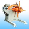 Uncoiler with Hold Down Arm Machine